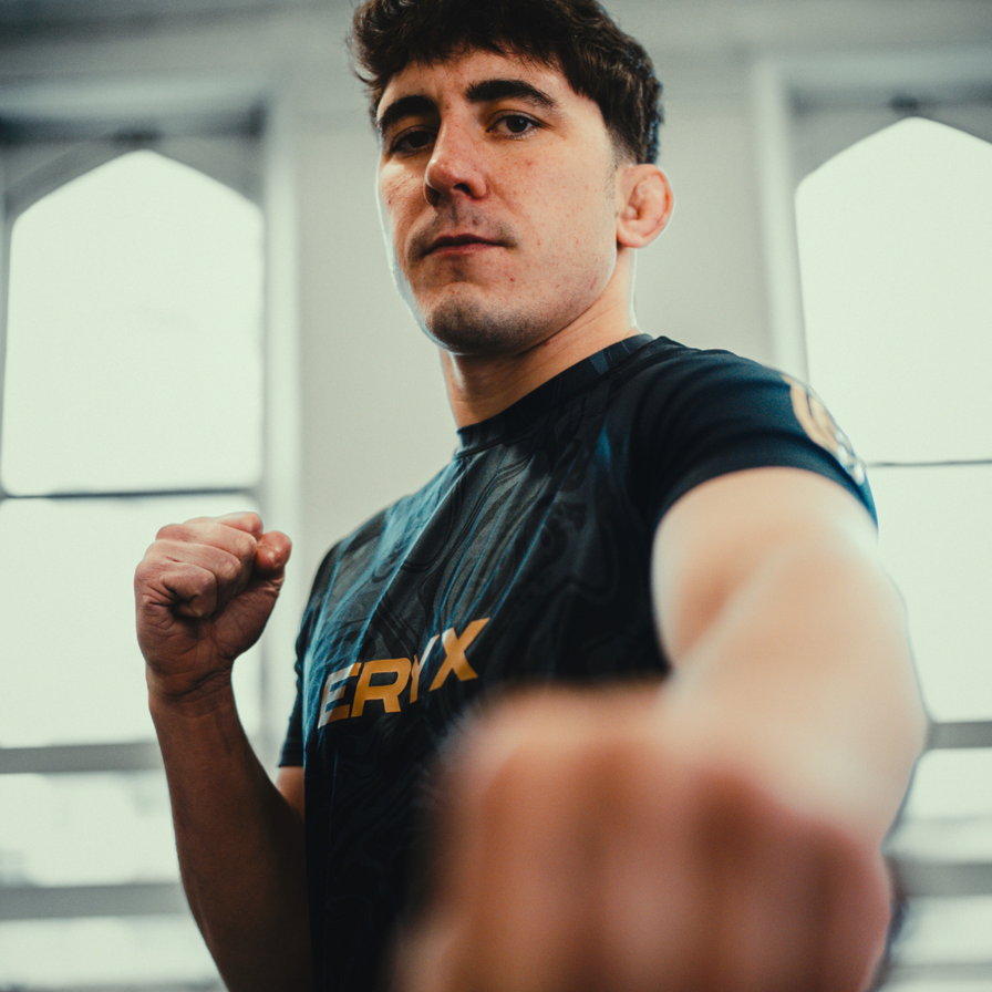 a hero shot of reece mcewan in eryxgear black marble set